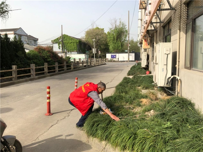 
			水墩社区开展治水护河宣传活动
		(图1)